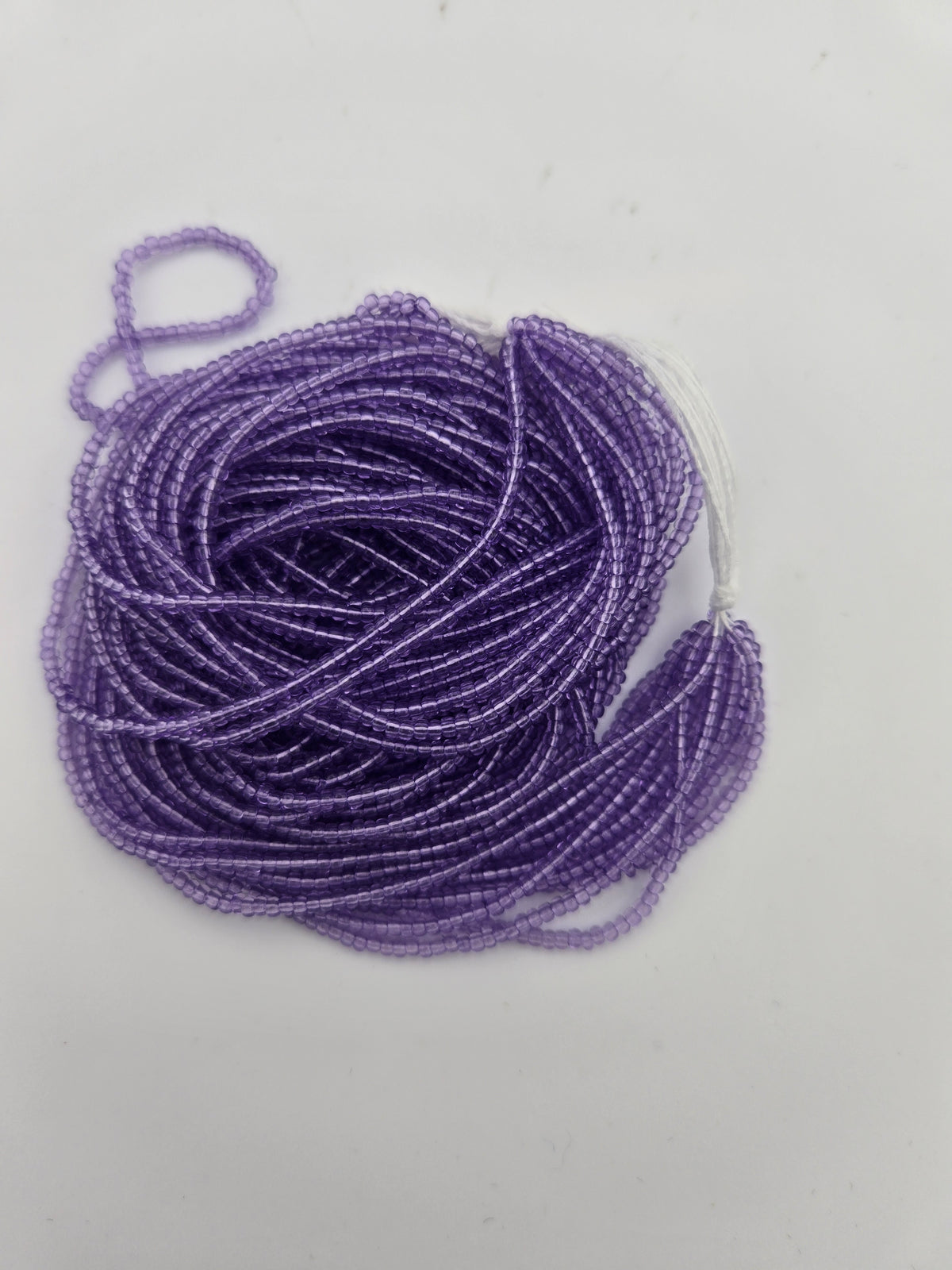Czech Seed Bead 11/0 Transparent Alexandrite Strung