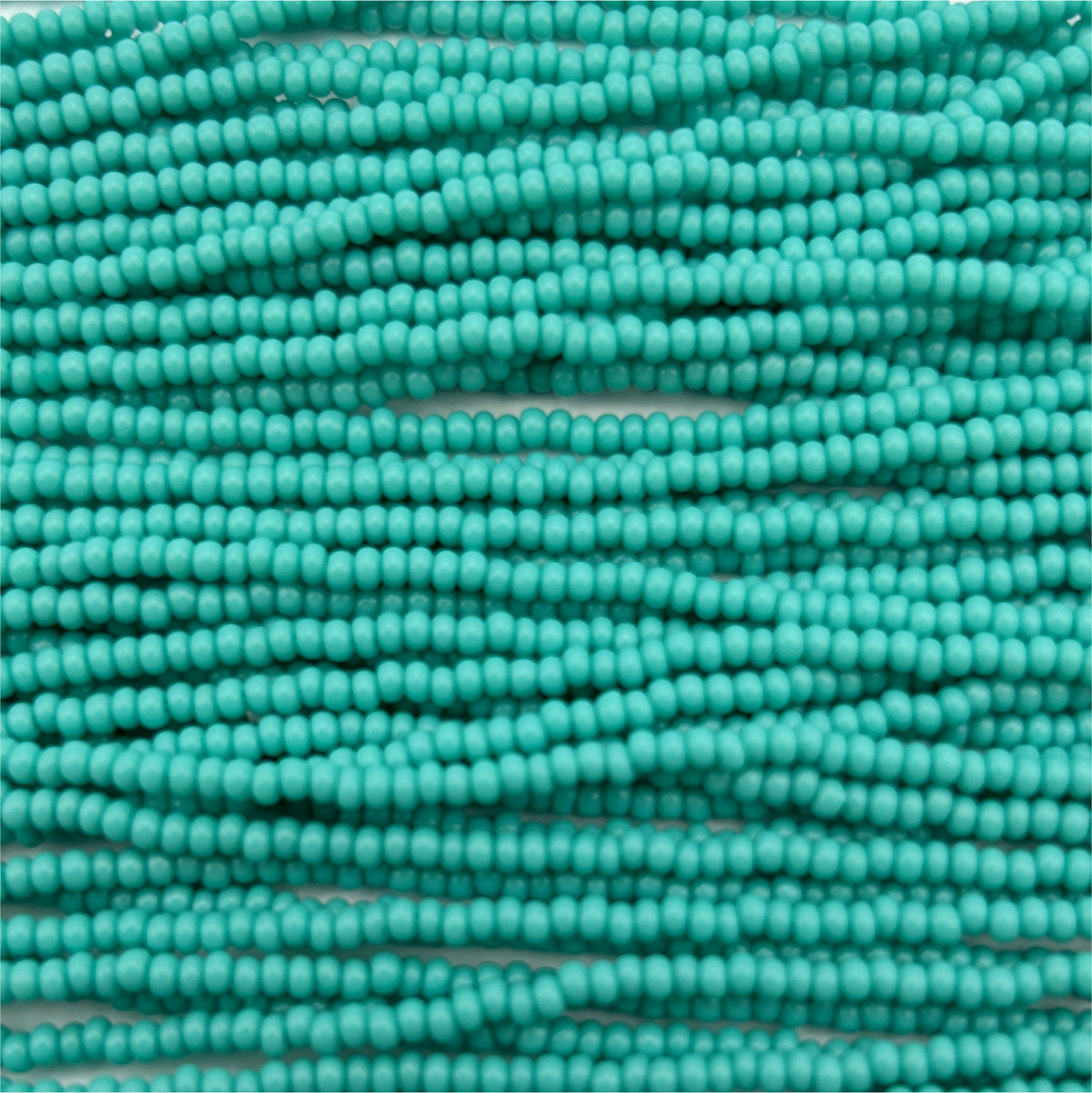 Czech Seed Bead 11/0 Op Turquoise Strung