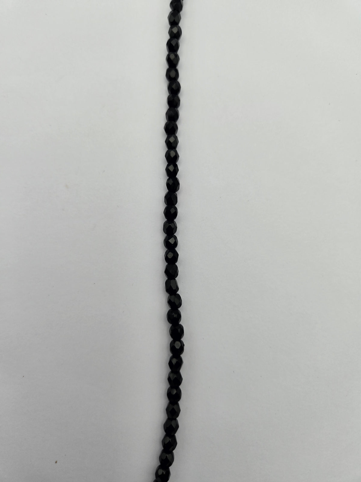 Fire-Polished Glass, Jet Black, 4mm Faceted Round, Approx. 100 per bag.