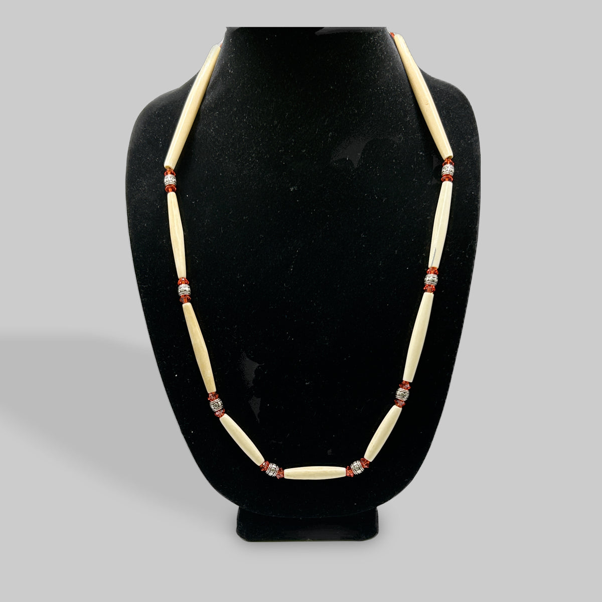 Orange and Metal Rondelles with Bone Necklaces by Wanetta Thompson